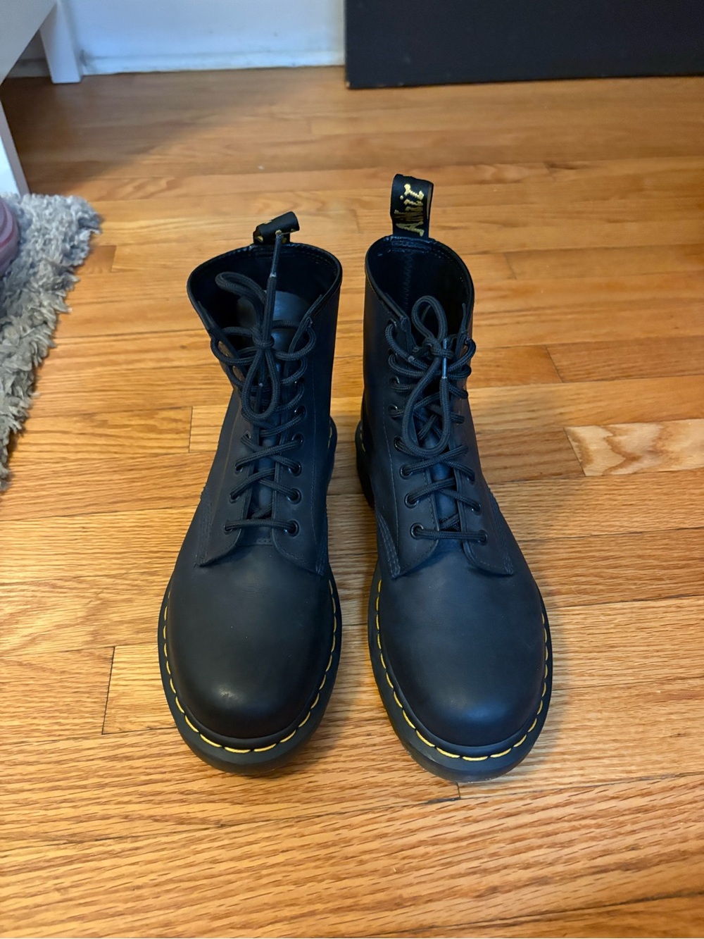 Dr. Martens Black Leather 8-Eye Lace-Up Boots with Yellow Stitching